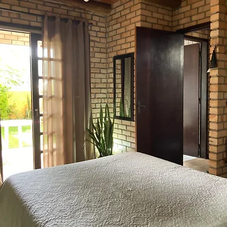 Quarto com banheiro privativo em Chalé Aconchegante.-3